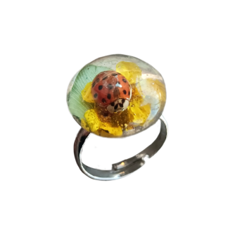 This viral resin ladybug ring is the must-have statement piece of the season, currently taking social media by storm and topping the wishlists of nature lovers and cottagecore fashion enthusiasts everywhere. As a trending accessory that has gone completely viral for its unique preservation of a ladybug, this ring is in high demand for anyone looking to capture a piece of the natural world in their everyday wardrobe. It is the perfect find for collectors of botanical jewelry, whimsical aesthetics, and handmade art who want to stay ahead of the latest fashion movements. Because each piece feels like a miniature terrarium, it has become a popular choice for gift-givers searching for something truly one-of-a-kind and meaningful. The surge in popularity for insect-themed jewelry and resin art means this specific design is a hot item for those who curate aesthetic outfits for platforms like TikTok and Instagram. Whether you are a fan of fairycore, goblincore, or simply love the luck associated with ladybugs, this ring is a sought-after treasure that blends curiosity with high-style appeal. Its status as a trending boutique item makes it a frequent sell-out, appealing to a wide demographic ranging from Gen Z trendsetters to professional women who appreciate artisan-crafted accessories. Don’t miss out on this popular botanical accessory that perfectly embodies the current movement toward sustainable-feeling, nature-inspired luxury and viral cottagecore staples.
