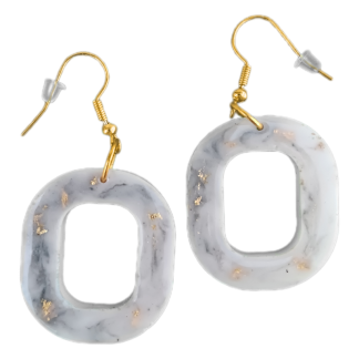 These handmade resin earrings have quickly become a must-have for the modern minimalist who values unique, artisan-crafted jewelry. Designed for the fashion-forward individual who balances professional elegance with a touch of boho-chic flair, these faux-marble dangles are trending across social media for their lightweight comfort and high-end aesthetic. Each pair is a conversation starter, featuring gold leaf accents and a sophisticated white and grey swirl that mimics natural stone, making them a top-selling choice for sustainable fashion enthusiasts. Whether you are searching for the perfect unique gift for her or an everyday statement accessory that transitions seamlessly from office wear to a night out, these geometric resin hoops are the top-rated jewelry trend of the season. Their popularity stems from their one-of-a-kind nature, ensuring that while you're wearing a pair of the year's most-wanted earrings, your style remains entirely your own.